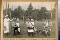 Nurses L. to R.: G. Wallfisch, W. Duane, Geo. Brown, and C. Brennan. In their laps, L. to R.: J. De. Martini, H. King, and S.B. Fugazi [?], Jr. - B.P.O. Elks, in G.G. [Golden Gate] Park. Feb. 1924