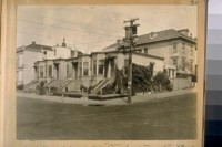 What is left of old Tucker town built in 1873. The photo was taken from Webster and Washington Sts. looking N. E. Tucker town was a block of homes from Washington to Jackson and from Buchanan to Webster, and was built by a Mr. Tucker. Phot. Taken Sept. 1924 and now Dec. 1924 these homes have been torn down