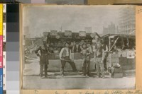 Officer Grunwald and the party back of the Stand. Sam Mish Gore cor. Market and O'Farrell or the Phelan Corner