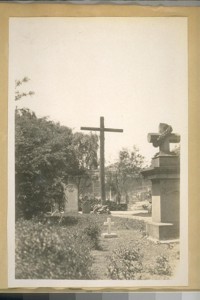 This old redwood cross in Mission Dolores Cemetery is from the days of the Padras [padres?] of the Missions. May 10th 1929