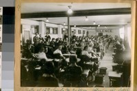 Photo of 122 Girls and 3 Men taking the Civil Service Examination for Stenographers for the City and County of San Francisco at the City Hall on Saturday June 25th, 1921