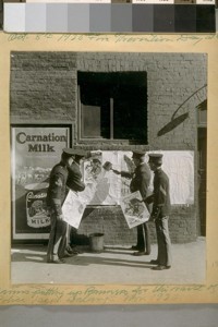 U.S. Marines putting up banners for the raise of the S.F. [San Francisco] Police Dept. salaries, Nov. 1920