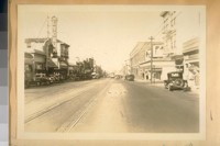N.E. from Virginia Ave. on Mission St. The Square Brick Building on the right is the Market St. R.R. [Railroad] Car Barn at Mission & 29th St