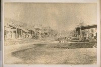 The old town of Shasta at one time the county seat of Shasta Co. 8-miles N.W. from Redding on the New Highway. The town at this date Feb. 1929 is a ghost town. Putting the rail road through and moving the county seat to Redding killed this place. The building [sic] that are now standing are all vacant. Photo taken in 1860