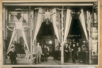 L. To R. - #1 Abe Ruef - #2 Wm. Cook - #3 Ben Adler - #4 Jesse B. Greenfield - #5 Not known - #6 Ed. Schafer - Known as the Coronado Bar. Hilbert Bros. Prop's N.W. cor. Ellis and Powell Sts. Aug. 23rd, 1899. Ben Adlers' Cigar Store