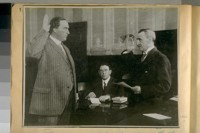 Chief of Police D.A. White taking his oath of office, 1911. L to R: D.A. White, Sect. Chas. F. Skelly and Max Goldberg, Pres. of the Board of Police Com