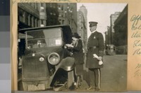Officer W. Joy collecting with the young Ladie [sic] for the Red Cross. 1920 at Market and Grant Ave