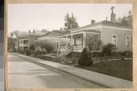 Officers' homes at the Presidio, San Francisco, built about 1860. The building at the end is the Officers' Club