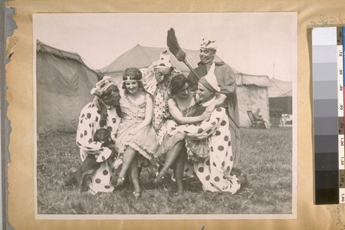 The Clowns from the Olympic Club and some of our Society young ladies at the Community Service Circus at Ewing Field, W. cor. Masonic Ave. & Turk St., March 25th & 26th, 1922. Lieut. of Police John J. Casey with the Broom