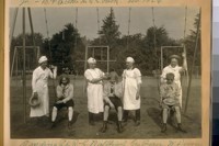Standing L. to R.: G. Wallfisch, Geo. Brown, W. Duane, and C. Brennan. In the swings, L. to R.: J. De Martini, H. King, S.B. Fugazi, Jr. - B.P.O. Elks, G.G. [Golden Gate] Park. Feb. 1924