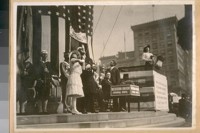 Photo same 1914 [Miss Rolph at the halyard]. [Opening of the Panama Canal]