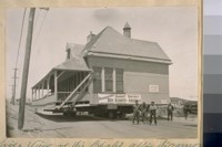 Side View of the Chalet after its removal from the Great Highway opp. the North Drive, with the 1st story removed