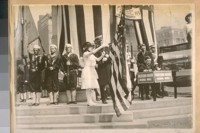 Photo same 1914 [Miss Rolph at the halyard]. [Opening of the Panama Canal]