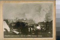 People watching their homes burn
