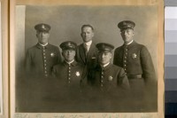Police Quartett [sic], standing L. to R.: John McGreevey, Corpl. McQuerney, Harry Frustuck. Seated L. to R. - Claude Ireland, and Raymond Harris. June 1924