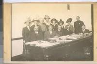 Seated at table L to R: J. Spiro, Jesse B. Cook, Pres. J. Woods, Alex O'Grady, Sect. Chas. Skelly. Chief White standing