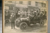 S.F. [San Francisco] Fire Dept. in the first Portola Parade, 1909. P. Shaughnessy Chief of the Dept. and front seat in auto Commissioner Newhall, rear seat Commissioner Delancy