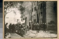 Natoma St. side of Waterhouse and Lester fire on Howard bet. 1st & 2nd Sts. about 1896. See Chief D. Sullivan at the Engine with the white helmet on