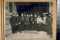 San Francisco Fire Dept. 1908 Engine Crew No. 2. North side of Bush St. next to St. George Stables between Grant Ave., and Kearney [Kearny]. L to : R. Murray, Chas. Brennan, Matt Collins, C. Ofberbeck, Capt. M. O'Brien, J. Collions, Jack Mitchell, Chas. Shebal, Chorus Girl, Chief Mills, Jim Flater
