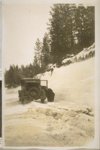 Just 3 miles south of Avery's Calaveras Co., our auto has pulled out of 4 feet of snow and is now on a strip of ice, with Joe A. Murphy breaking the ice, so we can start the auto, as you can see that there is no chance to turn around, so have to go on to Avery's 3 miles ahead. Oh what a snow ride. No more for me. Jany. 24/29