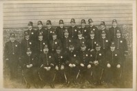 Party of Co. E--Banner Company (Bush St./Station). Top Row: Left to Right: Daniel O'Neill- Now Corporal