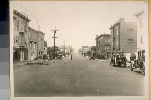 East on Balboa St. from 15th Ave. Aug. 1927. Shows parts of the auto after the valise explosion loaded with Nitro-Glycerin killing Dominick Crawford and sending Angelo Luca to the hospital. They are members of the Italian Black Hand