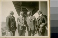 Aug. 1926 - L. to R.: Police Commissioners Andrew F. Mahony, Dr. Thos. E. Shumate, Chief of Police D.J. O'Brien, and Police Commissioner Jesse B. Cook, taken at S.P.R.R. [Southern Pacific Rail Road] Depot at 3rd & Townsend Sts