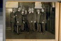 L. to R.: Dec. 1923 - A.F. Lemberger - Lieut. of Police Chas. Dullea - Jesse B. Cook, Police Commissioner - W.L. Hughson - Col. W.F. Culbertson - Capt. of Detectives D. Matheson - Elliott M. Epsteen, and Chief of Police D.J. O'Brien - Presenting Lieut. of Police Chas. Dullea with a star