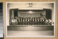 S.F. [San Francisco] Police Dept. Minstrel show, all its members are Police Officers, the Band included. The man in the center with the gray hair is Sergt. Pat. McGee