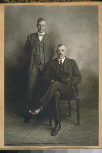 Det. Mike Burke [standing], S.F. [San Francisco] Police Dept., and Detective from Honolulu, 1920