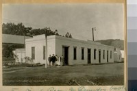 The Old Wash Room and Laundry, back of the Industrial school, now the Womens' Branch County Jail, Old San Jose Road near Ocean Ave. Built 1855. Jesse B. Cook at the side of the nurse