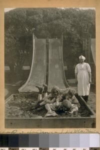 L. to R. in the sand - J. De Martini, S.B. Faguzi [?], Jr., and H. King - standing Geo. Brown