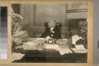 Dec. 1930. His Honor the Mayor Jas. Rolph Jr. at his desk in the City Hall, S.F. [San Francisco], just before he went to Sacramento to take his Oath of Office as Governor