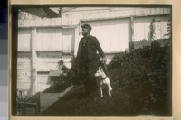 Engineer Frank Crockett at home with his dog, 1919