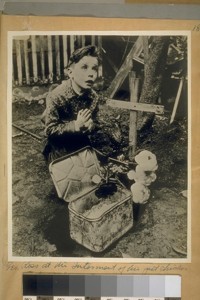 Geo. Ross at the interment of his pet chicken. Feb. 1928