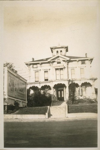 The old home of Judge Le Rue on the North side of East 12th St. between 13th and 14th Aves. in East Oakland. Built when this part of Oakland was Brooklyn in the 70's. He was the owner of the La Rue Wharf at the foot of 13th Ave. when the water came up there. Photo taken Oct. 3/28