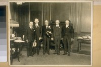 Photo taken in the Mayor's Office in the New City Hall. Left to right, front row: Theo. J. Roche, Thos. Walsh, Det. Sergt., Mayor Jas. Rolph, Jr., Jesse B. Cook and A. F. Mahony. Nov. 3rd, 1928