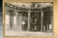 Interior on the old Hall of Records after the fire of April 18th, 1906. The white on floor are burnt records