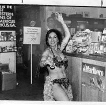 Jodette Johnson, a belly dancer from Sacramento, shakes up Billy's place in Plains. (Billy Carter, the president's brother, in Plains, Georgia.)