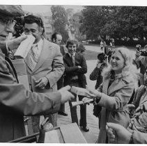 Herman Grabow, lobbying for the State Grange, passing out free butter on the west steps of the Capitol on his 78th birthday