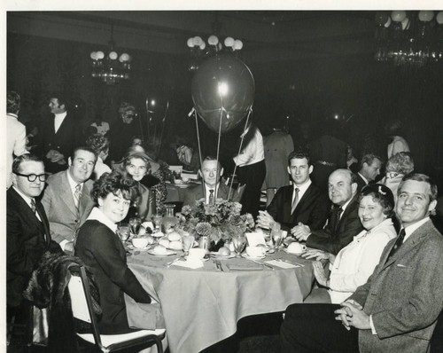 At a Banquet--L to R: Unknown, Doyle Swaim, Unknown, Helen Young, Bill Youngs, Larry Hornbaker, Dr. M. Norvel Young, Mrs. Seaver, Bill Banowsky