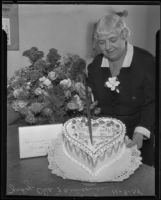 Judge Oda Faulconer cutting her birthday cake, Los Angeles, 1935