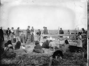Paiute indian funeral, showing a dog in the foreground, ca.1900