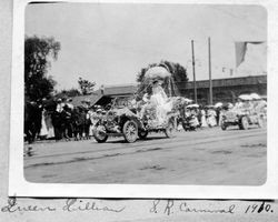 Queen Lillian in decorated car in the Santa Rosa Rose Carnival Parade, May 1910