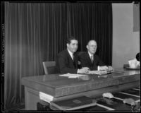 Justice William H. Waste seated next to Judge Joseph Marchetti in Marchetti's courtroom, Los Angeles, 1934
