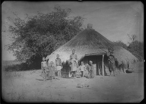 African people in front of a hut, southern Africa, ca. 1880-1914