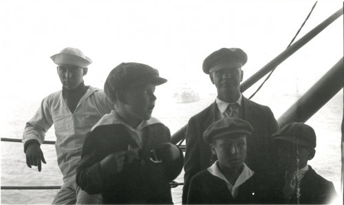 Unknown sailor, Ernest Buss (Ralph's son), Ralph Buss, Charley and Claude Emerson (Ralph's stepsons) at San Pedro, California