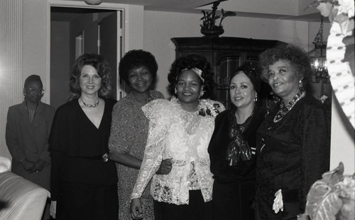 Gloria Brimberry posing with others at her recognition dinner, Los Angeles, 1989