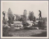 Pond with boulders and statue