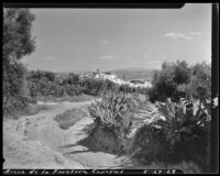 Town of Arcos de la Frontera, distant view from a dirt road, Spain, 1929